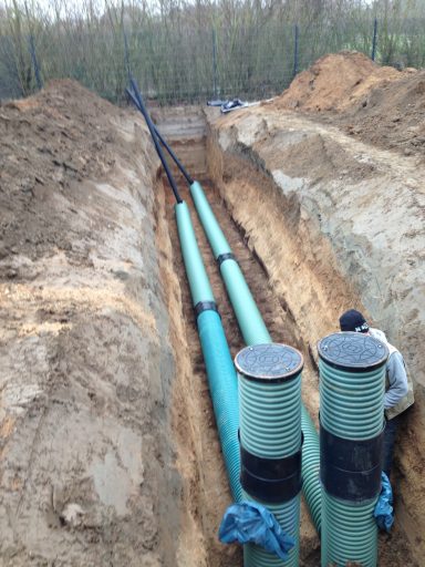 Komplette Entwässerungsarbeiten, Erdarbeiten, Erdaushub und fachgerechtes Setzen von Rigolen und Schächten in Moers am Niederrhein